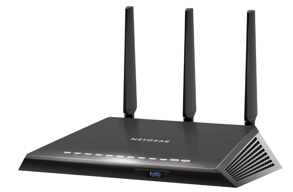 Black NETGEAR Nighthawk wireless router with three tall external antennas, glossy finish, front LED indicators, and ventilation grille on the side.